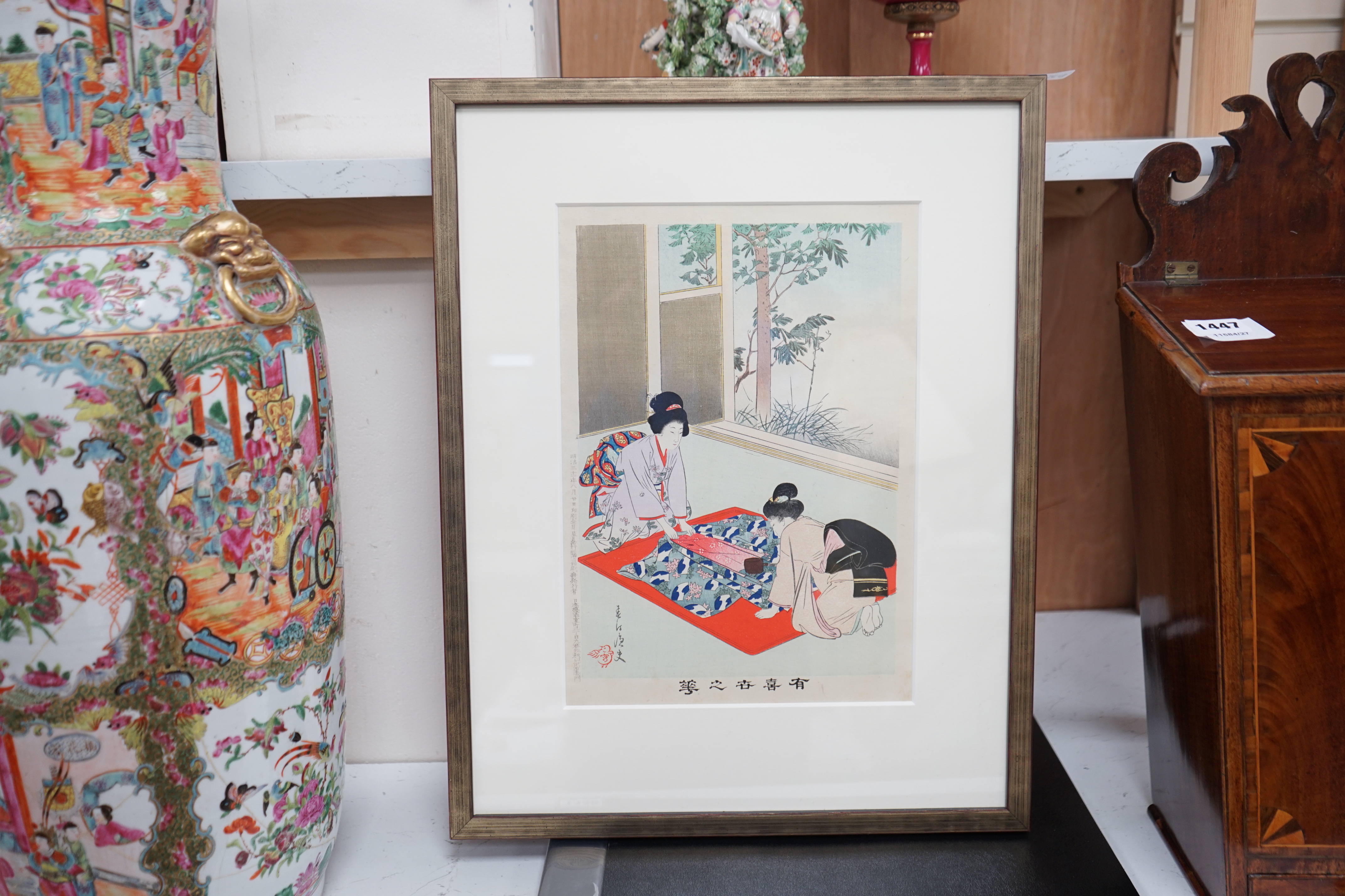 A set of four 20th century Japanese woodblock prints, Geisha at their traditional rituals, each with details verso, 33 x 23cm